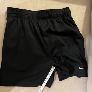 Nike women’s shorts with pockets. 4” Inseam. Black. thumbnail 1
