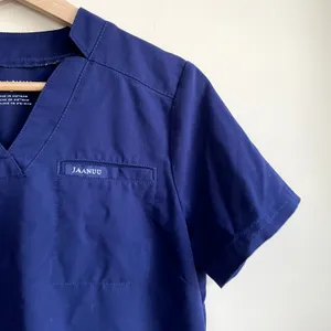 Jaanuu short sleeved navy blue scrubs top women's small front pockets v-neck‎ thumbnail 2