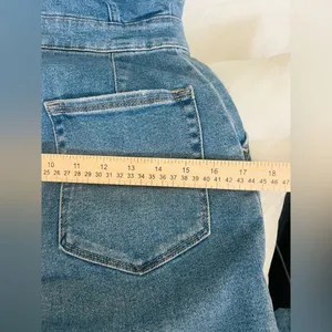 Good American denim jumpsuit, and it has a very clean, modern-utility vibe SZ 2 thumbnail 8