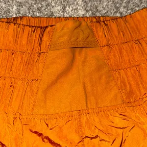 Free People Rust Orange Smocked Waist Athletic Shorts thumbnail 3