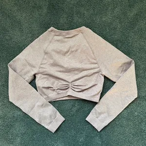 Gymshark Pink Heathered Adapt Marl Seamless Long Sleeve Fitted Crop Top Size Medium thumbnail 4