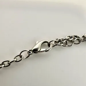 Silver tone feather pendant necklace thumbnail 7