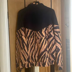 Free People Movement NWOT Walk The Line tiger print pullover, size medium 8/10 thumbnail 6