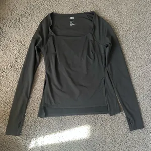 Girlfriend Collective high-low black long sleeve top size small thumbnail 1