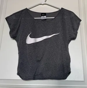 Nike Dri Fit Crop Top with Zipper Side Pocket thumbnail 1