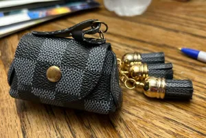 Mini black purse keychain Size undefined thumbnail 1