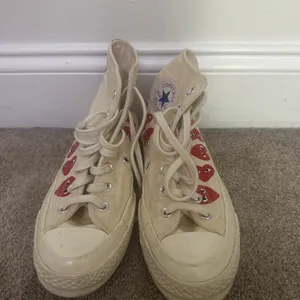Creme Off White Converse Chuck Taylor All Star high top sneakers with red heart-shaped eyes #converse #hearts thumbnail 3