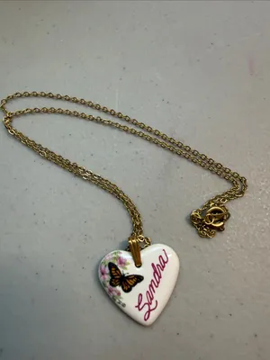 Source Unknown Gold-Tone Chain with White Heart Pendant and Butterfly Detail thumbnail 4
