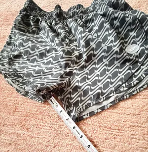 Nike Women’s M Dri-FIT Tempo Running Shorts Black Gray Print thumbnail 7