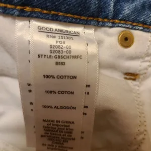Good American Blue Distressed Jean Shorts thumbnail 7