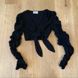 Lioness Long Sleeve Tie Front Crop Top in Black thumbnail 1