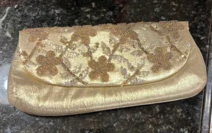 Gold clutch bag thumbnail 1