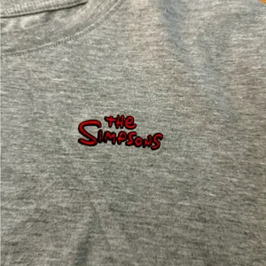 The Simpsons Bart Lisa Grey Crop Top Long Sleeve Embroidered Size M EUC thumbnail 7