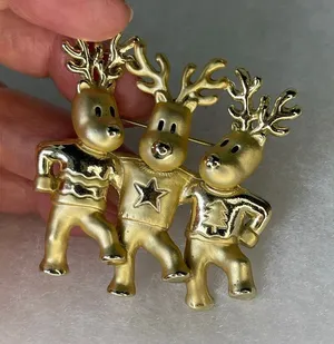 Vintage AJC three dancing deer gold tone brooch. thumbnail 1
