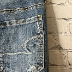 American Eagle 77 high rise flared leg jeans size 12 thumbnail 8