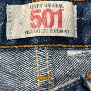 Levi's Original 501 Ripped Blue Jean Shorts thumbnail 3