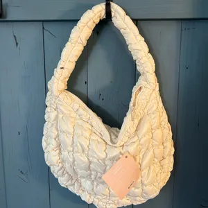 Ariana Grande Cream Quilted Hobo Bag thumbnail 1
