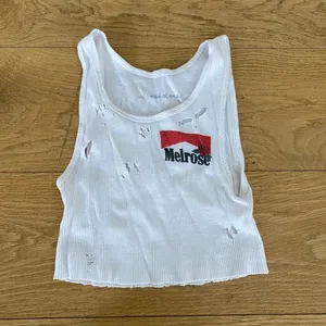 IAMKOKO LA Cropped Tank Top with Melrose Graphic in White thumbnail 1