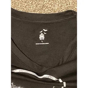 Source Unknown Halloween Long Sleeve Black Shirt with Skull Logo. Size Large thumbnail 4