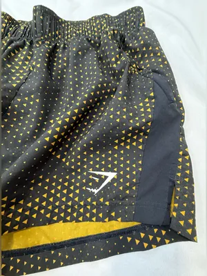 Gymshark Black Shorts with Gold Triangle Print thumbnail 2