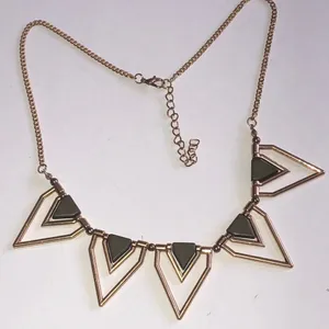 Geometric Gold Tone and Dark Gray Brown Boho Statement Necklace thumbnail 1