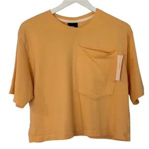 Nike orange cropped pocket front t shirt size M thumbnail 2