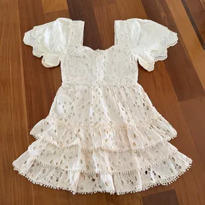 Versona Cream Eyelet Tiered Dress with Scalloped Puff Sleeves thumbnail 1