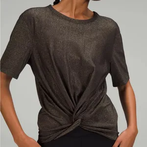 Lululemon Women's 12 Black and Gold Metallic Crescent Spark Athletic Tee Top thumbnail 1