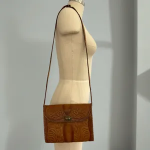 Vintage 70s Floral Tooled Cowhide Leather Crossbody Bag thumbnail 1