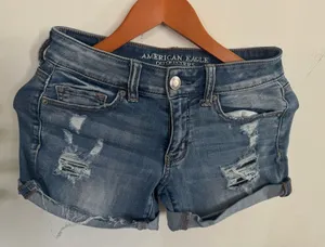 American Eagle Outfitters Distressed Blue Denim Roll-Hem Shorts thumbnail 1