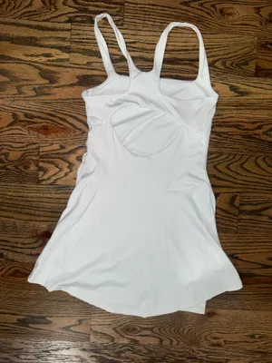 White athletic dress.  thumbnail 2