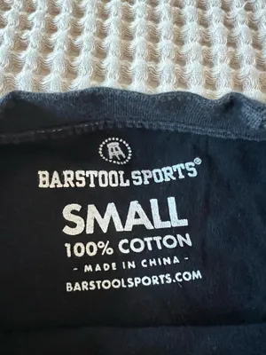 Barstool Daddy Gang black crop tee with bleached tie-dye detailing. Soft cotton feel and bold varsity-style logo. Stylish, easy-to-wear top for everyday play and layering. thumbnail 3