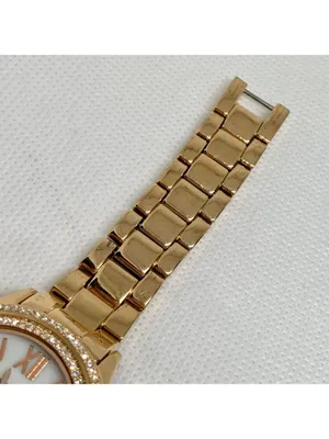 Anne Klein rose gold tone women watch mop dial 33mm Roman numerals 6” running thumbnail 4