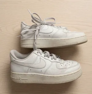 Nike Air Force 1 Low Triple White Leather Sneakers Women’s thumbnail 1