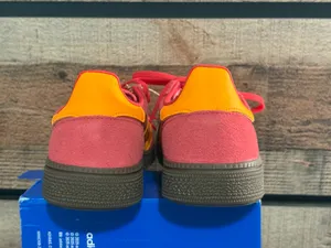 Adidas handball poles in a pretty red with light orange stripes thumbnail 6
