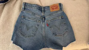 Levi's jean shorts. never worn bought to small. size 23 thumbnail 2