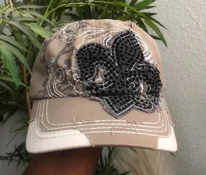 Y2K Gothic Beige Black Cyber Punk studded rhinestone large fleur de lis distressed messenger cap hat #fairy #grunge #punk #skater #whimsygoth bedazzled Adjustable thumbnail 1