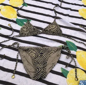 Black and Tan print bikini with gold accents thumbnail 1