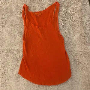 Urban Outfitters orange renewal tank- medium thumbnail 1