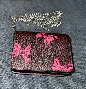 NWT NEW Coach Burgundy and pink bow logo Crossbody Purse with silver Chain thumbnail 1