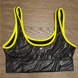 Fabletics neon yellow and black size medium sports bra thumbnail 2