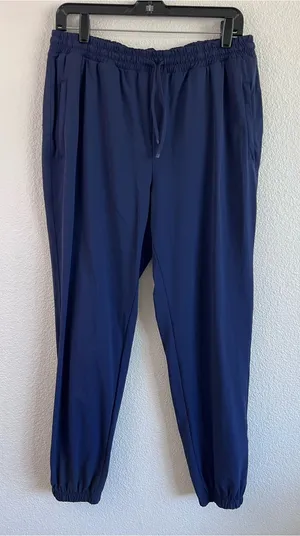 Fabletics Women's All Day Jogger Mid Rise Sweat Wicking Zip Pockets Deep Navy thumbnail 1