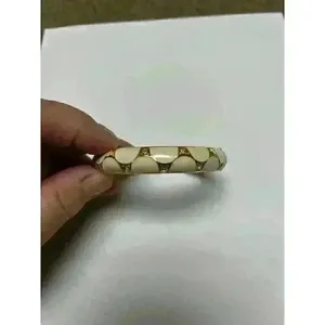 White enamel bracelet with gold/rhinestone accents‎ thumbnail 2