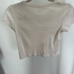 Brandy Melville Beige Switzerland Tee thumbnail 3