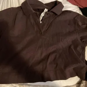 Lululemon Heavyweight Cotton Short-Sleeve Polo Shirt T-Shirt in Espresso thumbnail 1