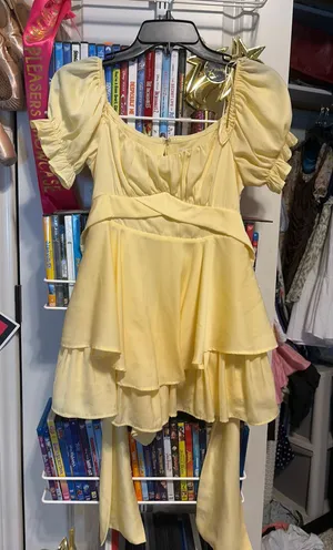 A short yellow floaty dress I think it might be from Francesca‘s thumbnail 1