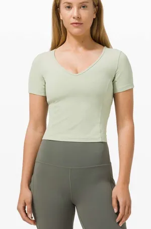 Lululemon Nulu Cropped Slim Yoga Short Sleeve | Green Fern thumbnail 1