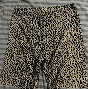 Adika Leopard-Print Bike Shorts in Tan and Black thumbnail 1