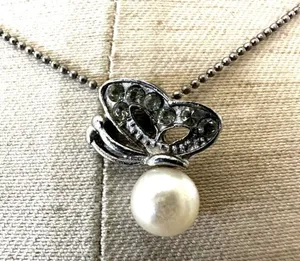 Vintage silver tone butterfly faux pearl pendant necklace thumbnail 1