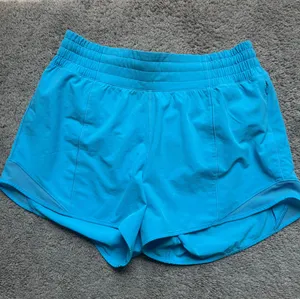 Lululemon Hotty Hot 4 inch blue shorts thumbnail 1